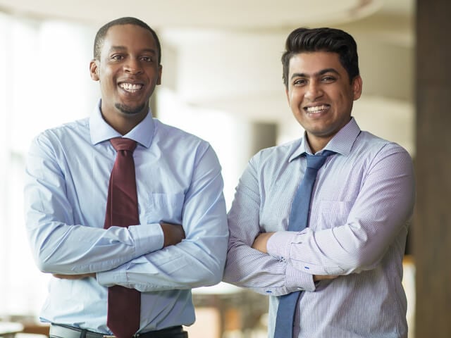Two smiling TEKsystems consultants