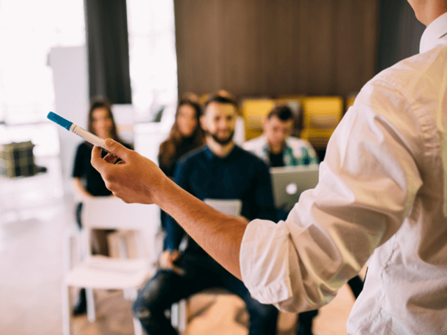 A classroom of employees in comprehensive training