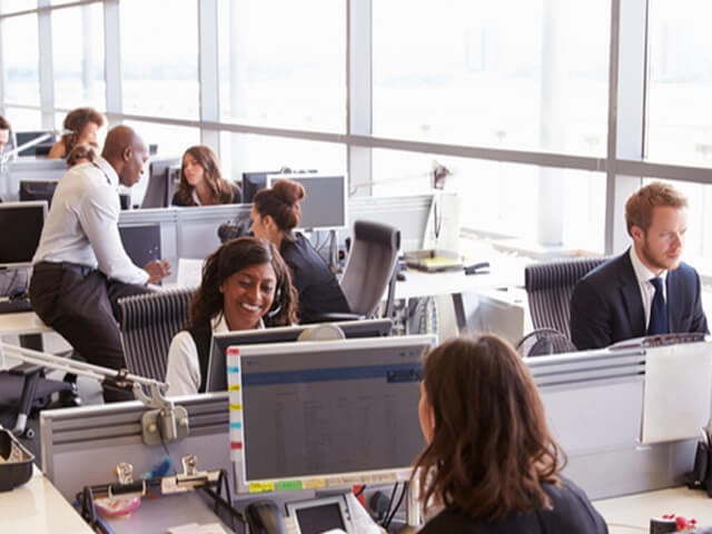 artificial intelligence automates some tedious tasks for workers in an office