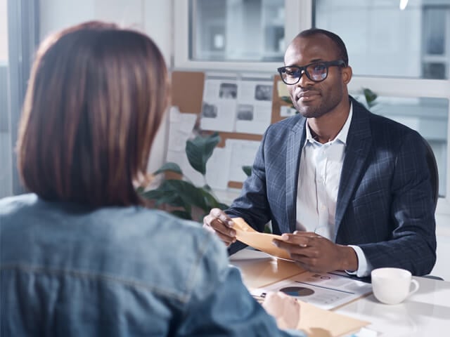 two people reviewing information