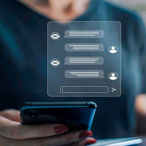 Mobile device showing a chat interface with automated messages.