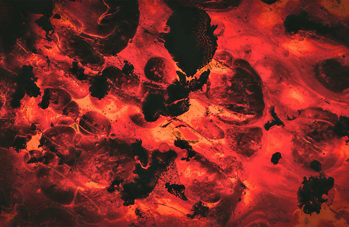 abstract, fiery scene dominated by intense shades of red and orange