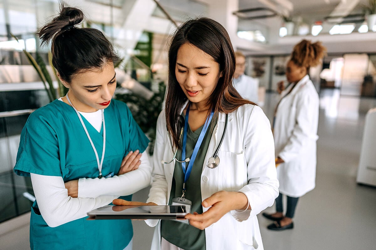 Medical professionals looking at the chart