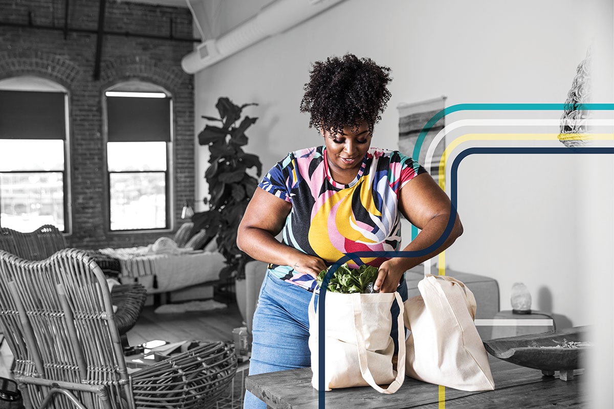 woman getting her groceries from her online order