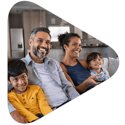 Family of four watching media on a streaming device