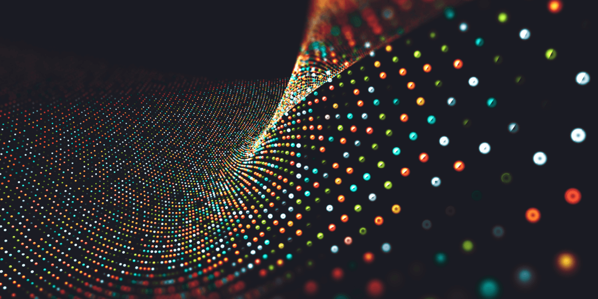 Bright glowing pattern of abstract dots giving the appearance of movement.