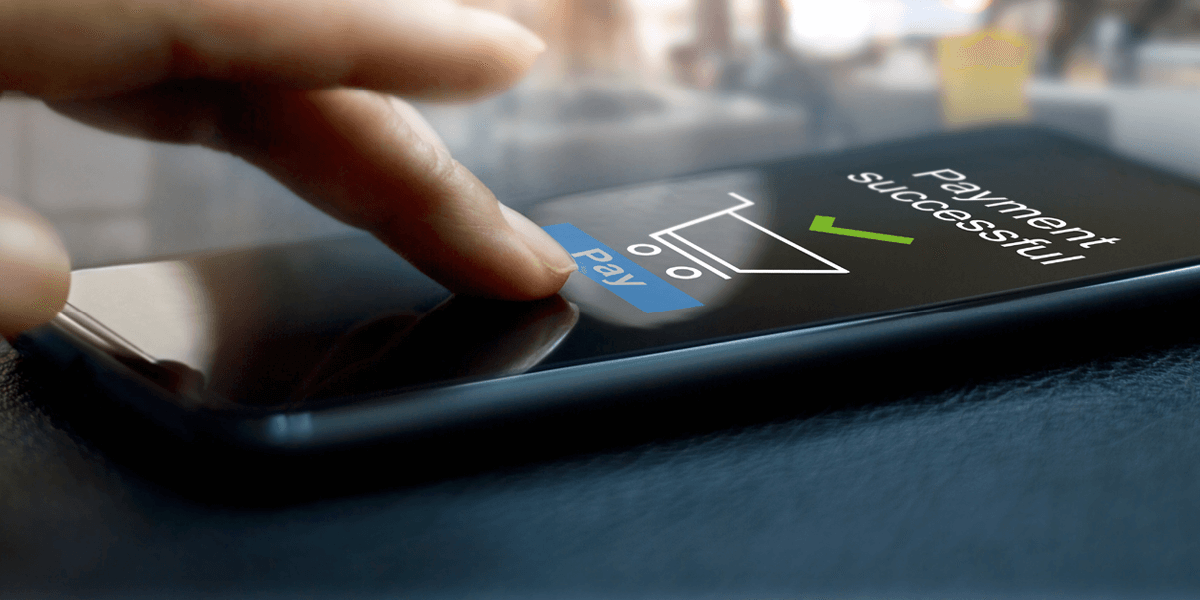 A customer paying using their phone