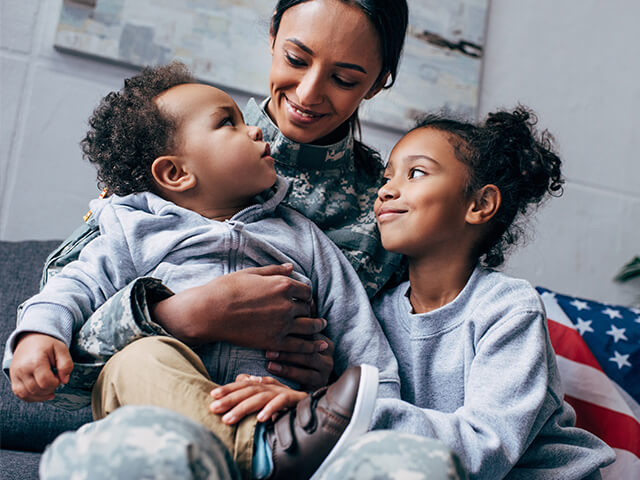 a female veteran and her children