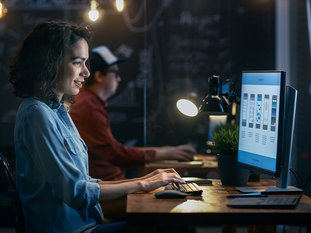 young female professional overseeing high-performance hosting