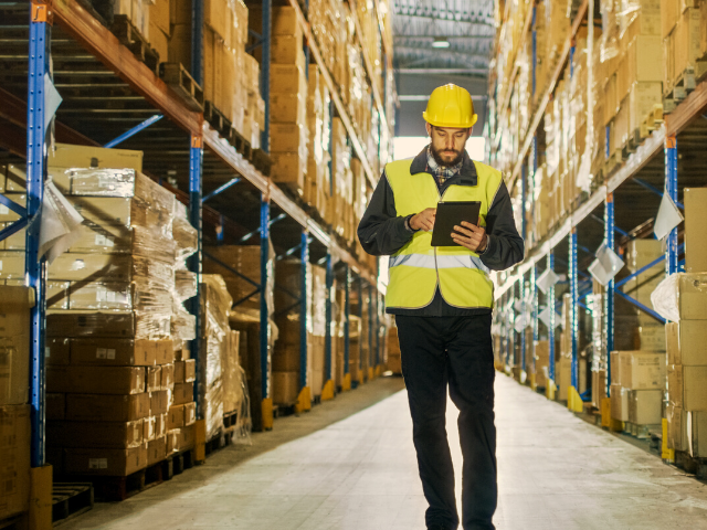 workforce employee reviews IT infrastructure reports in warehouse
