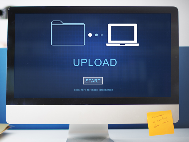 blue screen with a file icon moving to a computer icon