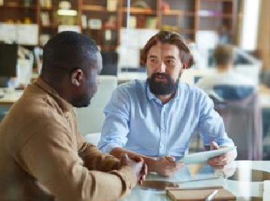 two career professionals meet in a coffee shop