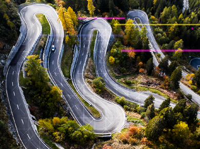 winding road with digital overlay representing avoiding obstacles when creating data-driven culture