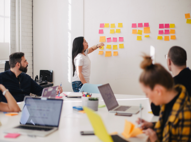 group of young professionals brainstorm learning solutions