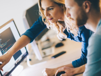 devops engineers working at desktop