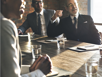 experienced business men enjoy a meeting