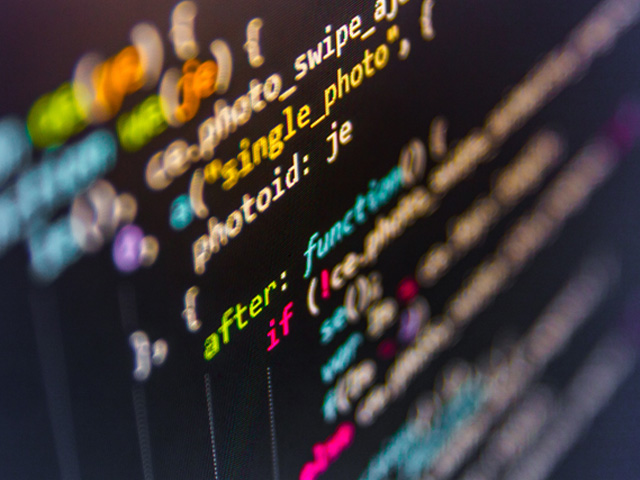neon colored HTML code on a black screen