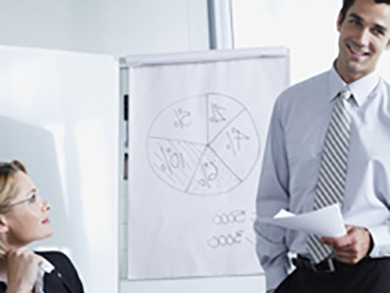 male business analyst presenting to people