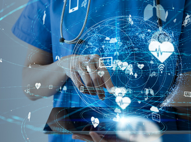 healthcare professional in blue scrubs reviewing information on a wireless tablet; digital overlay shows multiple icons associated with the medical field.