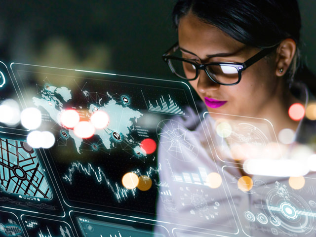 A woman takes an online training course for Google Data Engineer