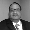 black and white head shot of Ian Salazar