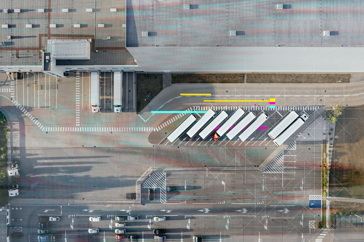 overhead view of trucks carrying deliveries optimized with an effective data and analytics strategy