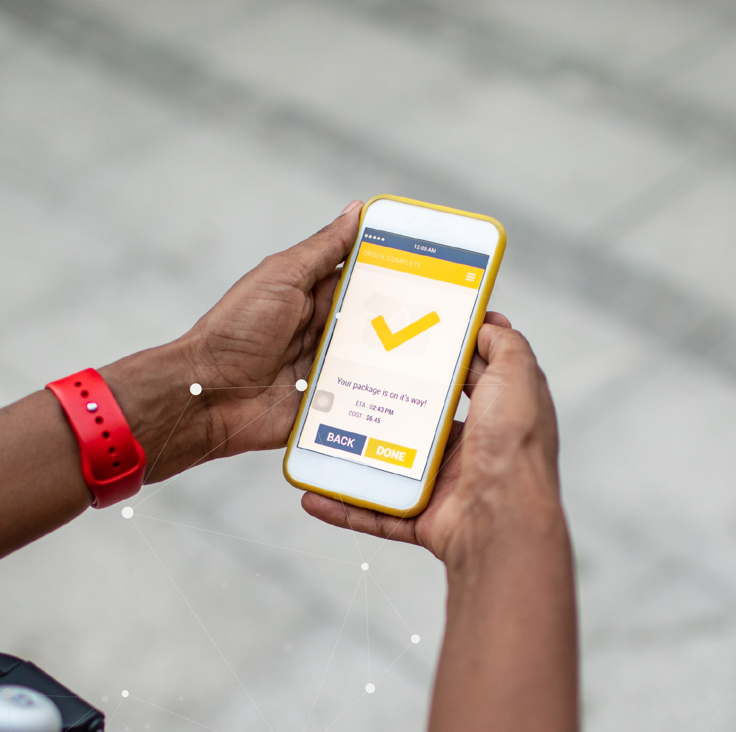 A person holds a phone with a completed mobile order; an overlay draws connections over the phone to help convey personalized content