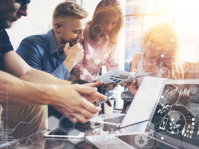 a business team talking about organizational mindshifts that enable digital transformation