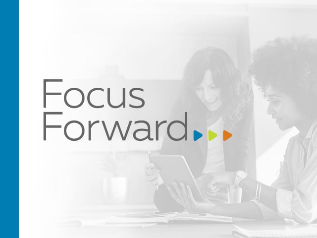 two people reviewing the Focus Forward campaign on their iPad