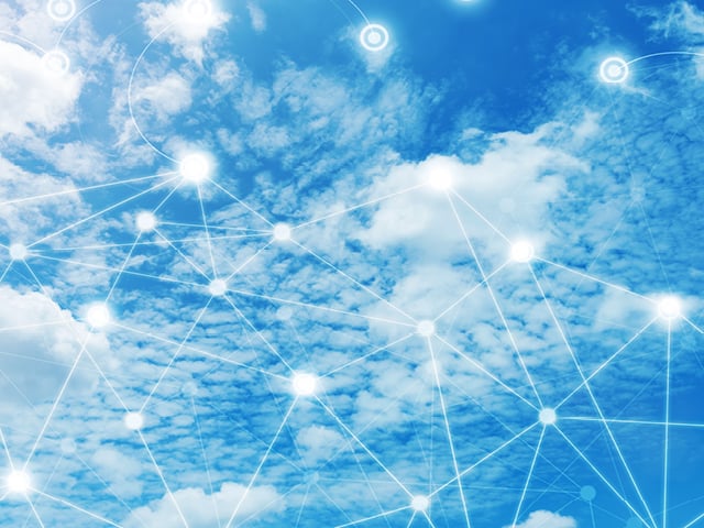 digital connections shown over fluffy white clouds