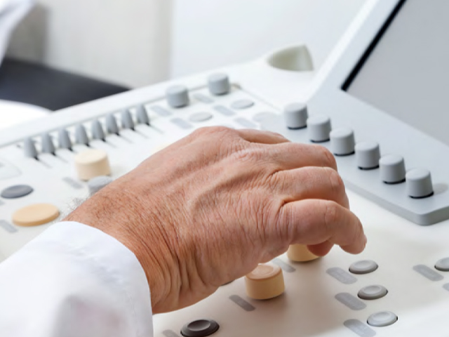 healthcare professional reviewingdata on medical system