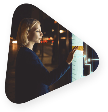 Woman interacting with a large communications touchscreen panel