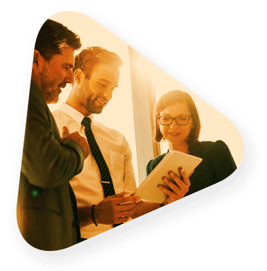 Corporate support employees reviewing a document