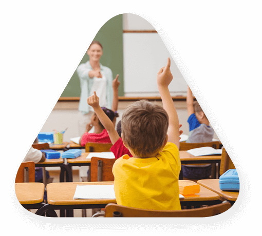 educator calling on a student in a yellow shirt during class
