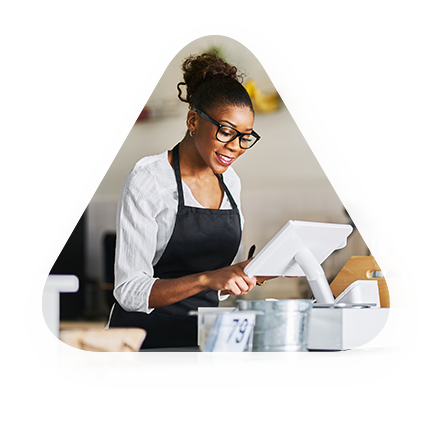 female fast-food employee uses new cloud based POS system