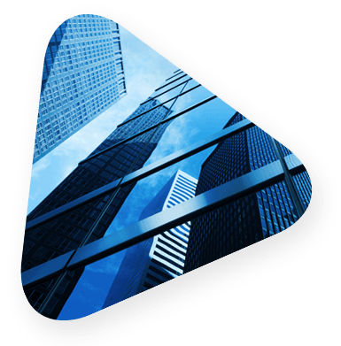 triangle with a view looking ground up the front of a skyscraper