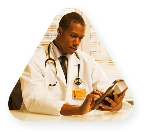 Doctor reviewing healthcare data and analytics on his tablet