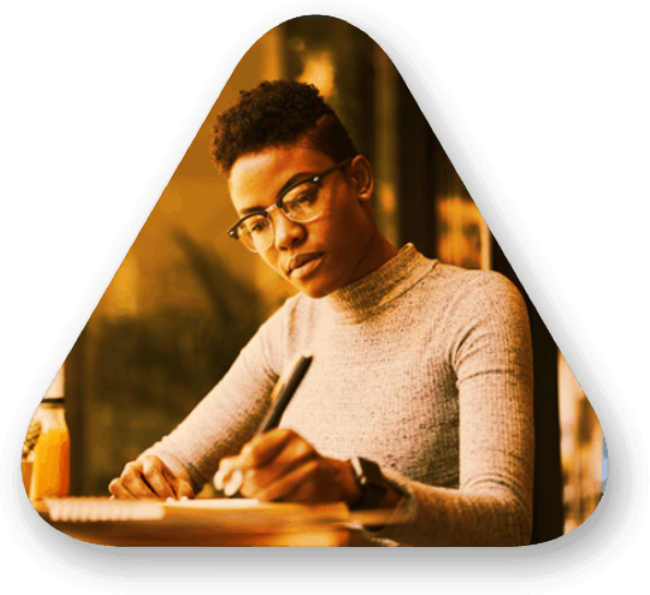 large triangle contains a professional woman writing in a notebook