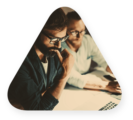 People managing risk and security on laptops and tablets