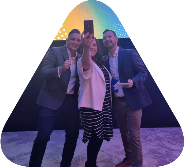 Three TEKsystems employees taking a selfie